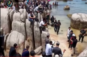 A re-enactment of the crime was held at Sairee Beach on Koh Tao on 3 October 2014. (Reuters screen grab)