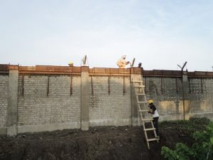 Indian workers construct a wall around the Sittwe deep-sea port terminal. (PHOTO: Kaladan Movement)